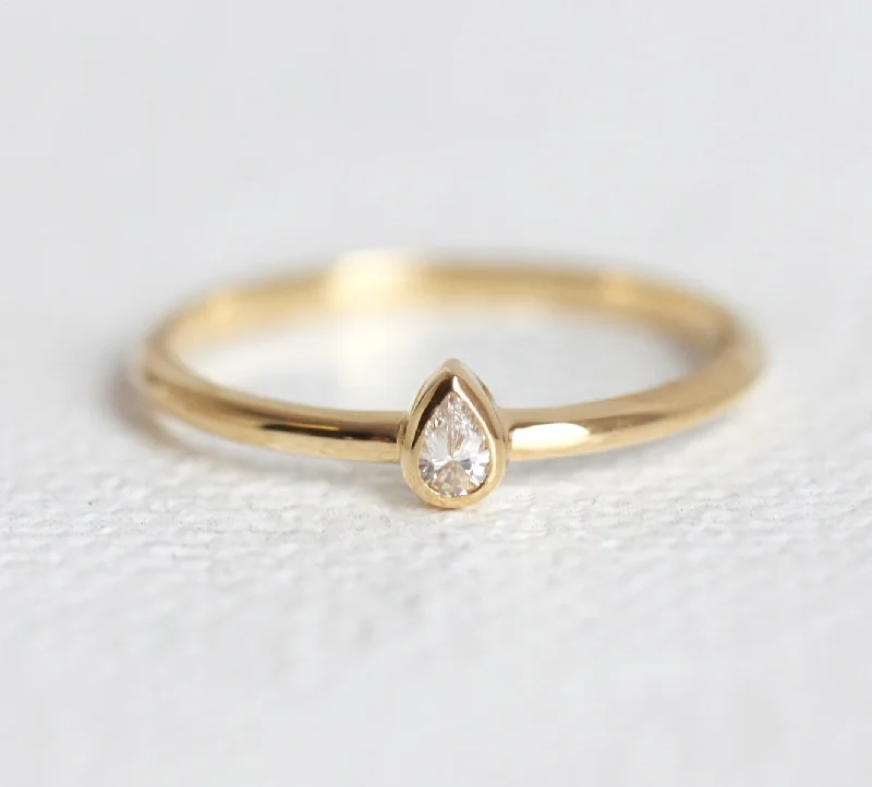 Delicate & Classy: Petite 0.1Ct Pear Solitaire Diamond Ring